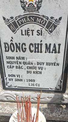Ảnh bia mộ của liệt sĩ Đồng chí Mai