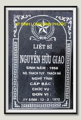 Ảnh bia mộ của liệt sĩ Nguyễn Hữu Giao