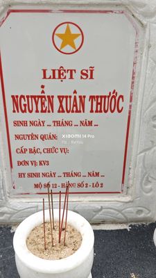 Ảnh bia mộ của liệt sĩ Nguyễn Xuân Thước
