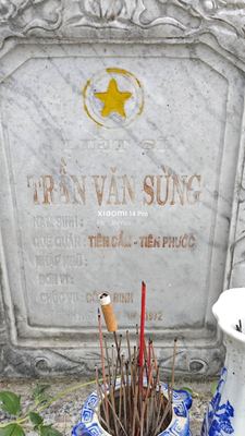 Ảnh bia mộ của liệt sĩ Trần Văn Sửng